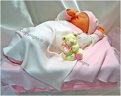 Unique Baby Shower cake design featuring a sleeping baby. All clothing ...