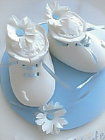 White booties Christening cake for boys