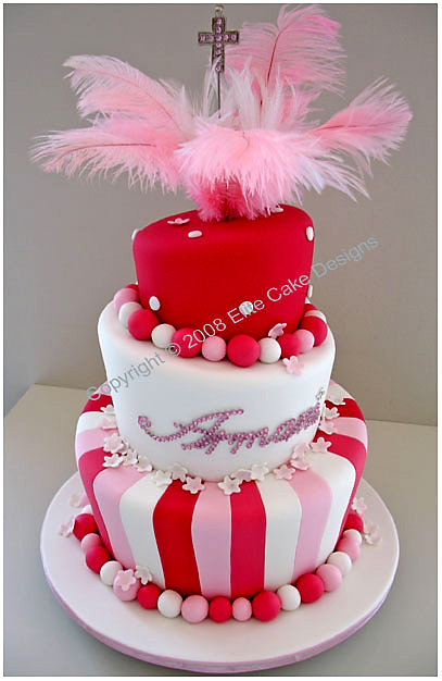 Christening cake with feathers and cross